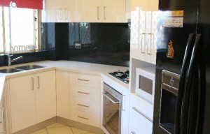 Small Kitchen-Black Spalshback                                  